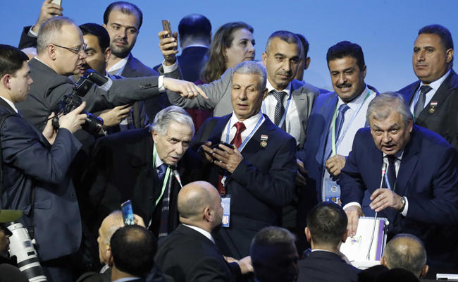 Attendees depart at the end of a session of the Syrian Congress of National Dialogue in the Black Sea resort of Sochi, Russia, ib January 30, 2018. (REUTERS/Sergei Karpukhin)