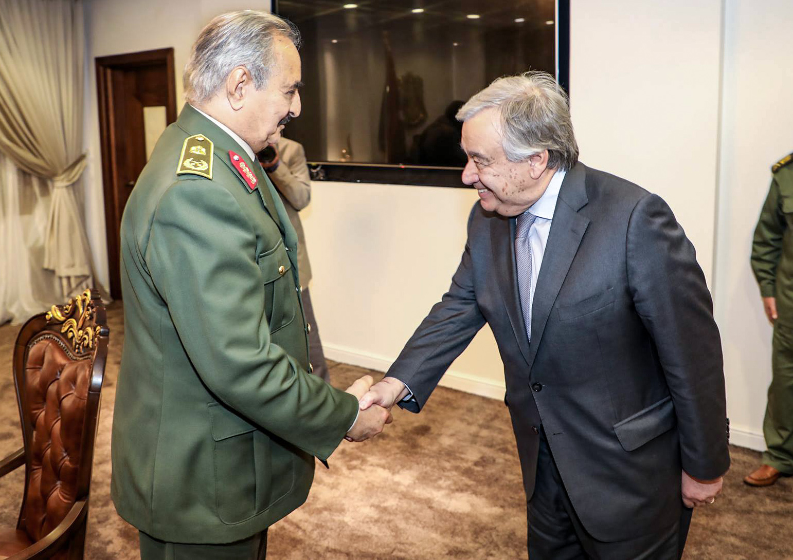 Commander Khalifa Haftar with United Nations Secretary General Antonio Guterres, at Haftar's office in the Rajma military, base 25 kilometres east of Libya's second city of Benghazi. (AFP)