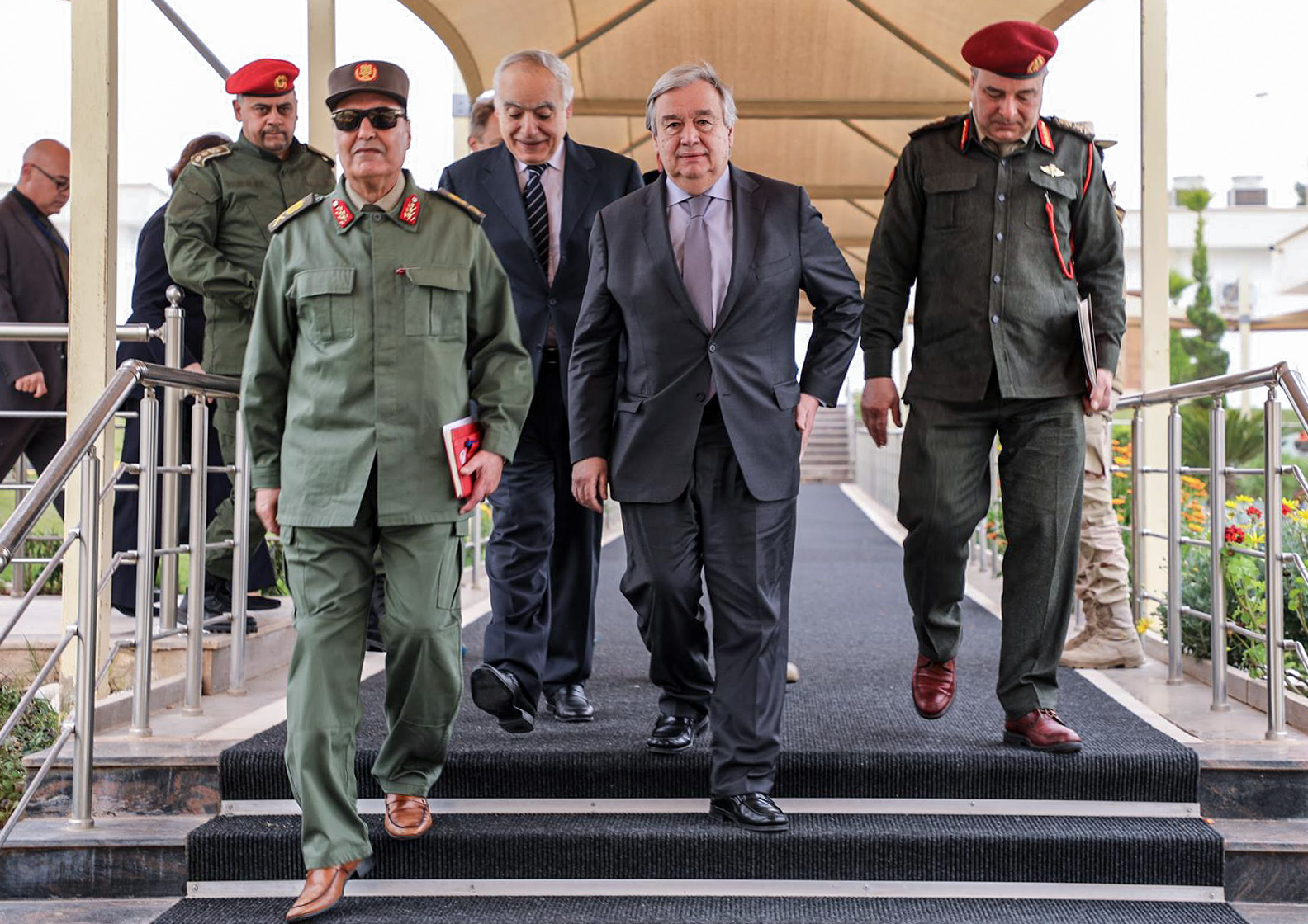Commander Khalifa Haftar with United Nations Secretary General Antonio Guterres, at Haftar's office in the Rajma military, base 25 kilometres east of Libya's second city of Benghazi. (AFP)