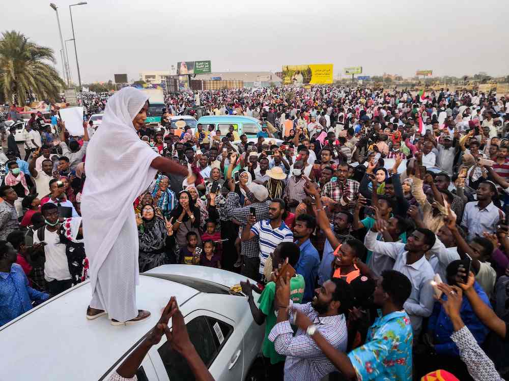 Alaa Salah propelled to internet fame earlier this week after leading powerful protest chants against President Omar Al-Bashir. (File photo/AFP)