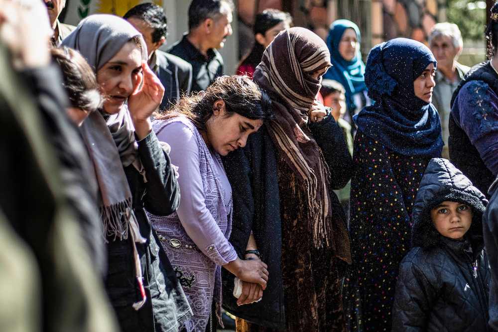 Syrian Kurds repatriated 25 women and children from Iraq’s Yazidi minority after freeing them during the final push against Daesh. (AFP)