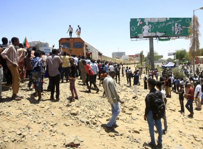 Sudanese protesters rally in the area of the military headquarters in the capital Khartoum on April 15, 2019. (AFP)