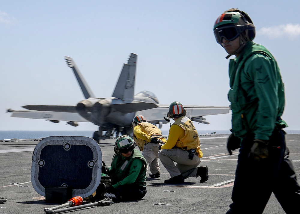 An F/A-18E Super Hornet launches from the flight deck of the USS Abraham Lincoln in the Arabian Sea. (Reuters/US Navy)