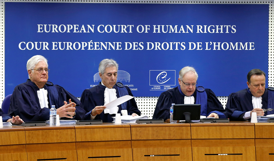 Judges of the European Court of Human Rights sit in the courtroom during a hearing in Strasbourg in this file photo. (Reuters)