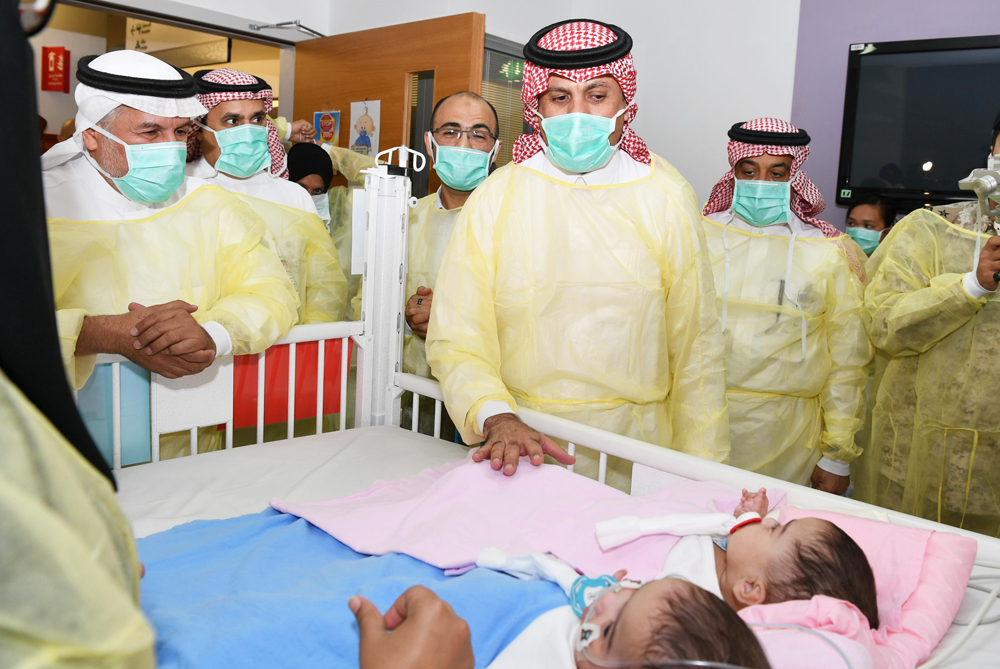 Saudi National Guard minister visits conjoined twins after