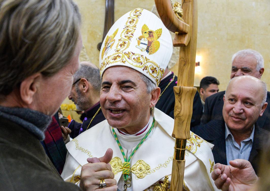 Archbishop Najib Michaeel was inaugurated in a ceremony in attended by Catholic leaders from Iraq and beyond, as well as local officials and residents. (AFP)
