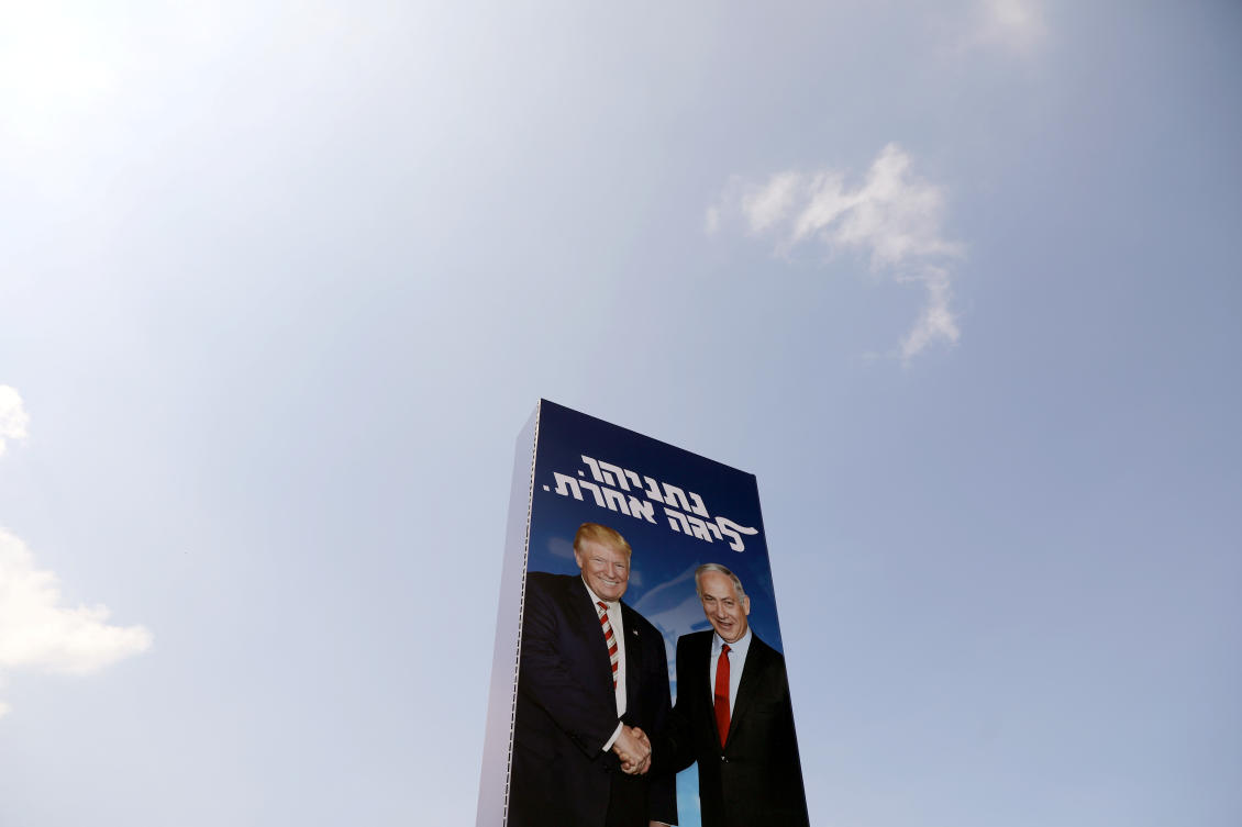 Israeli Prime Minister Benjamin Netanyahu and U.S. President Donald Trump are depicted in Netanyahu's Likud party election campaign banner in Tel Aviv, Israel September 9, 2019. The words in Hebrew read,