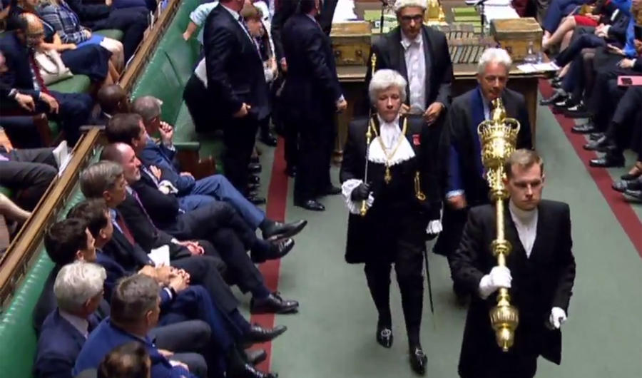 A video grab from footage broadcast by the UK Parliament's Parliamentary Recording Unit (PRU) shows Lady Usher of the Black Rod Sarah Clarke (CL) walking with Speaker of the House of Commons John Bercow (CR) from the House of Commons to the House of Lords in London on September 10, 2019, during the ceremony to prorogue (suspend) parliament. The UK Parliament was prorogued, or suspended, until October 14, 2019. (AFP)