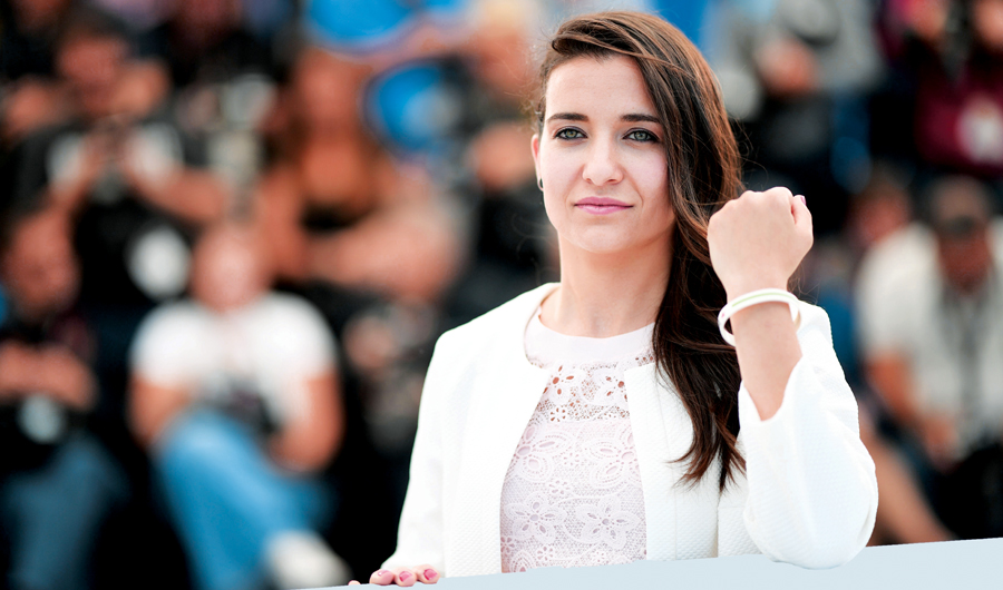 Syrian director Waad Al-Kateab poses during a photocall at the 72nd edition of the Cannes Film Festival in France. (AFP)