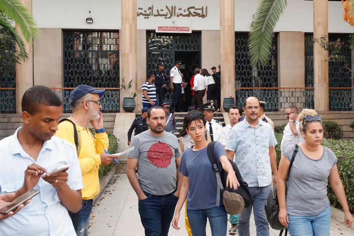 Friends and relatives of Moroccan journalist Hajar Raissouni leave the court following her sentencing for alleged sexual relations outside marriage and an illegal abortion in the capital Rabat, on September 30, 2019. (AFP)