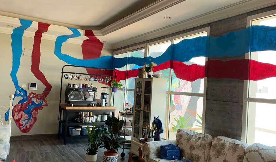 Nahla Ghafaili decided to paint away her boredom during the curfew but soon ran out of canvases, so decided to paint on objects in her home. (Photo/Supplied)