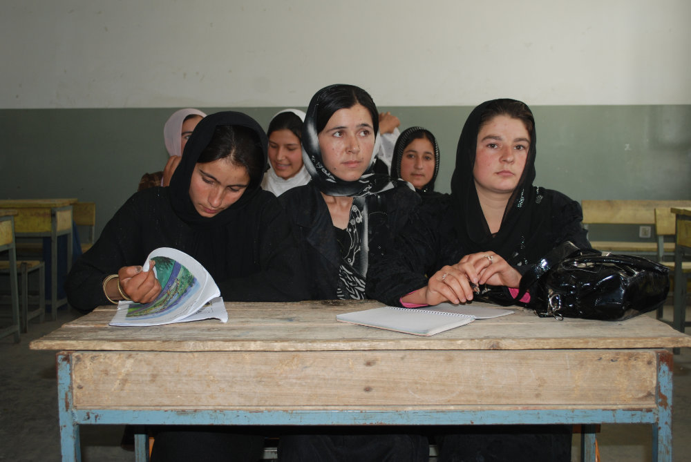 In this file photo, Afghan girls attend a class at a school in Baharak, northern Afghanistan. (Shutterstock)
