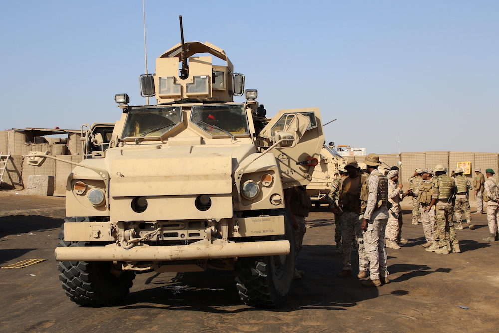 Saudi military personnel are pictured at the gate of the Arab coalition’s base in Aden, Yemen Dec. 13, 2020. (Reuters)