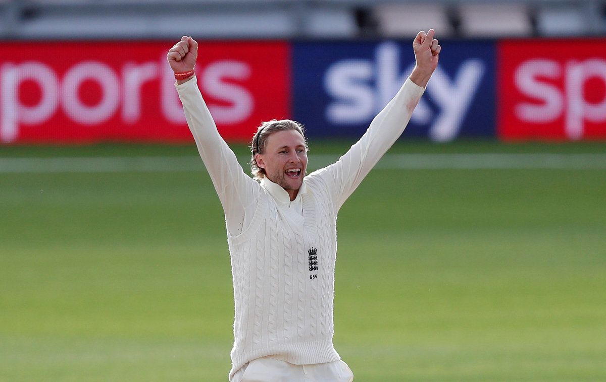 England's Joe Root celebrates the wicket of Pakistan's Asad Shafiq, as play resumes behind closed doors following the outbreak of COVID-19. (REUTERS/File Photo)