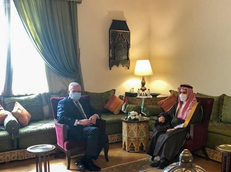 Saudi Arabia’s Minister of Foreign Affairs Prince Faisal bin Farhan meets his Palestinian counterpart Riyad Al-Maliki in Cairo on Monday, Feb. 8, 2021. (SPA)