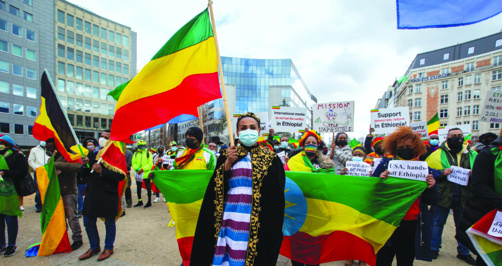 Members of the Ethiopian community stage a protest in Brussels on Thursday to raise awareness on the situation of Ethiopia’s conflict-hit Tigray region. (AFP)