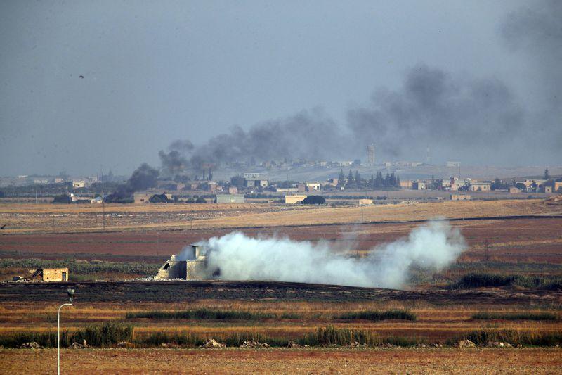Smoke billows from targets inside Syria during a bombardment by Turkish forces on Oct. 9, 2019 against Kurdish fighters. (AP file photo)