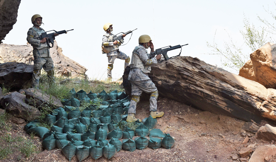 Saudi border guards keep watch along the border with Yemen in the al-Khubah area in the southern Jizan province. (AFP file photo)
