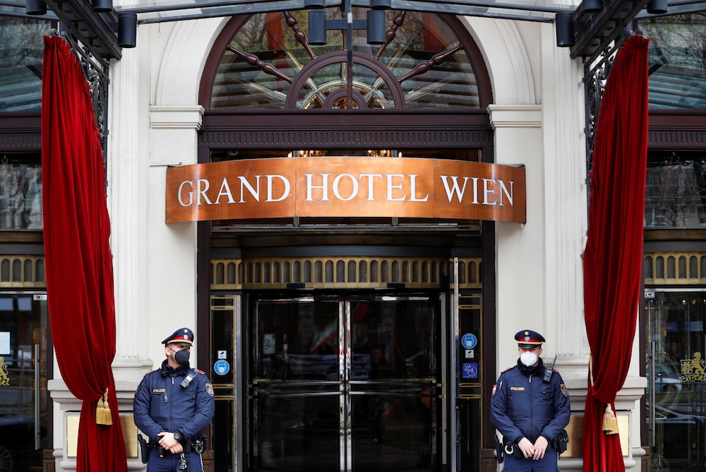 Police stand outside a hotel where a meeting of the Joint Commission of the Joint Comprehensive Plan of Action (JCPOA), or Iran nuclear deal, is held in Vienna, Austria, April 20, 2021. (Reuters)
