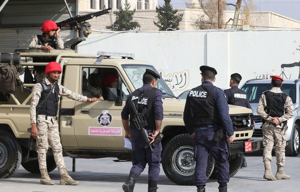 Jordanian security forces stand guard outside the military State Security Court in Amman. (File/AFP)