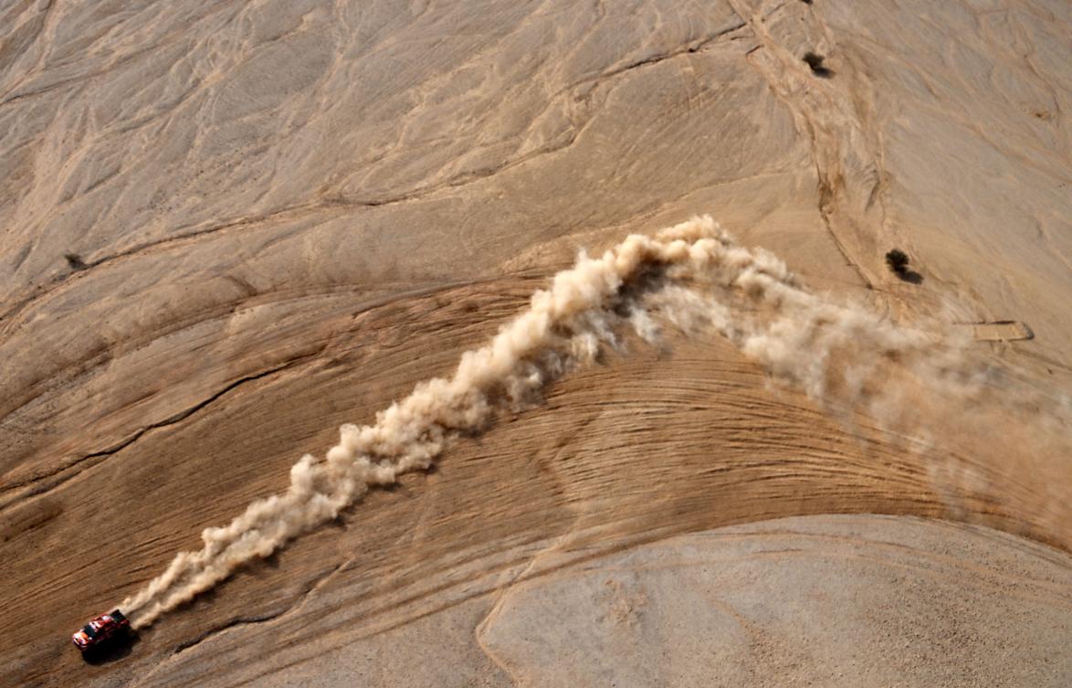 Argentinian driver Orlando Terranova and co-driver Daniel Oliveras Carreras of Spain compete during the Stage 6 of the Dakar 2021 near the Saudi capital Riyadh, on January 7, 2022. (AFP)