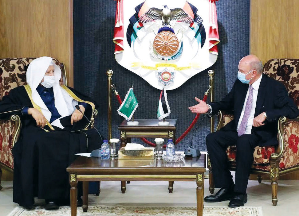 Jordanian Senate Speaker Faisal Al-Fayez, right, receives Saudi Shoura Council Speaker Abdullah Al-Asheikh in Amman on Thursday. (SPA)