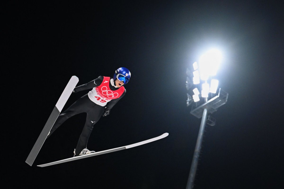 Japan's Ryoyu Kobayashi competes during the Ski Jumping Men's Normal Hill Individual 1st Round on Feb. 06, 2022 during the Beijing 2022 Winter Olympic Games. (AFP)