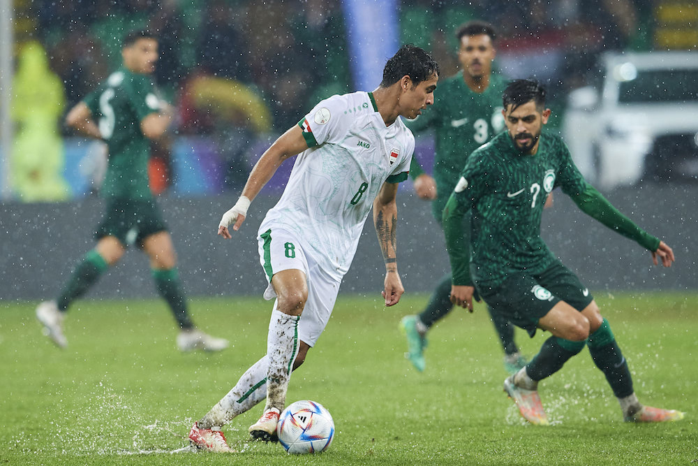 Iraq defeated Saudi Arabia 2-0 on Monday evening at an almost flooded Basra International Stadium to go top of Group A of the Arabian Gulf Cup. (Twitter/@AGCFF)