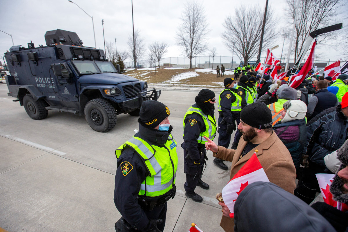 Truckers pull out vehicles from key US-Canadian border bridge, protests swell elsewhere thumbnail