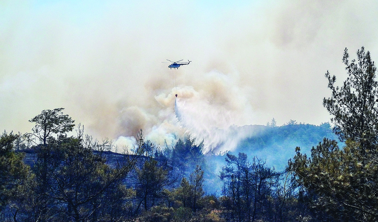 Turkey battles wind-driven wildfire near resort for 3rd day
