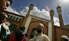 Muslim worshippers gather for Friday prayer on the streets outside the mosque of the Muslim centre in east London. (AFP/File Photo)