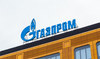 Volatile rouble slumps to 10-day low; Gazprom shares extend losses