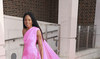 Actress Naomie Harris shows off pink gown by Tony Ward at grand prix ball