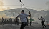 Palestinians say Israel troops kill 3 in West Bank raid