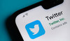 UPDATE 1-Twitter plan to fight midterm misinformation falls short, voting rights experts say