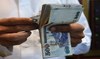 Saudi police bust four-member gang dealing in counterfeit money