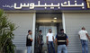 Savers storm Lebanese banks to demand their money