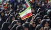 Iranian girls heckle member of feared paramilitary force