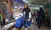 Iranian city shops shut to step up pressure on clerical rulers