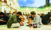 Muslims breaking their fast at a free public iftar in Al-Azhar Mosque in Cairo. (AP)