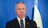 Israel’s ‘fired’ defense chief hangs on