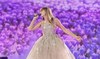 Taylor Swift debuts new Elie Saab gown at world tour 