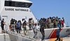 Italy arrests 12 people over speed boat migrant trips from Tunisia