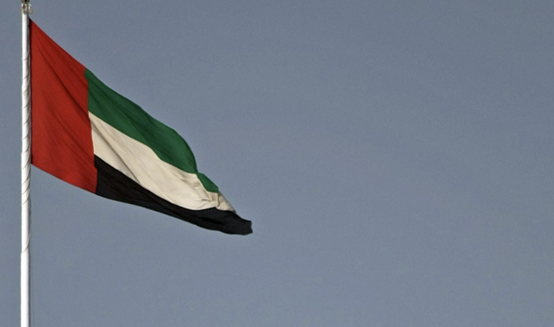 A huge UAE flag flutters in Abu Dhabi. (File/AFP)
