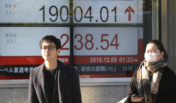 Tokyo stocks up at break as yen tumbles