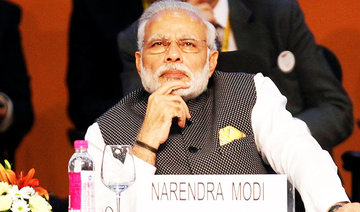 Modi in a spin as he replaces Gandhi as face of India’s homespun cotton