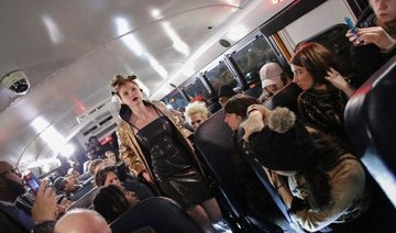 Artist makes NY fashion week debut... on a bus