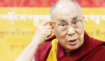 Dalai Lama tells Suu Kyi to ease Rohingya tension