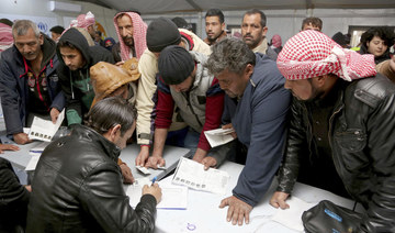Syrian refugees,They register their names at the Azraq office for employment on Sunday, Feb.18, 2018. (AP)