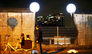 Berlin Wall becomes global symbol of liberty